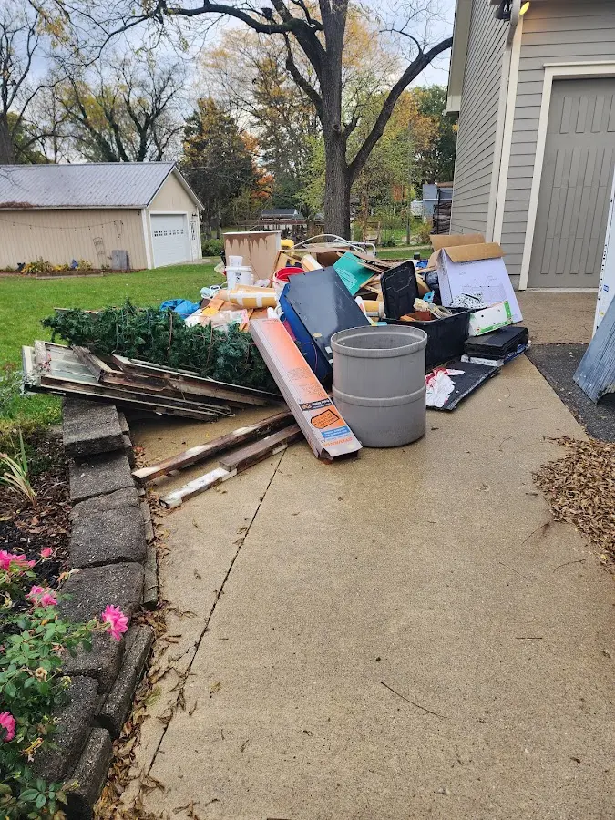 Dumpster being loaded with debris for 3 Yard Dumpster Rental in Berkeley